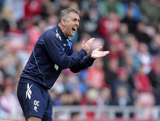 Owen Coyle shouts instructions during a match against Sunderland, April 28, 2012